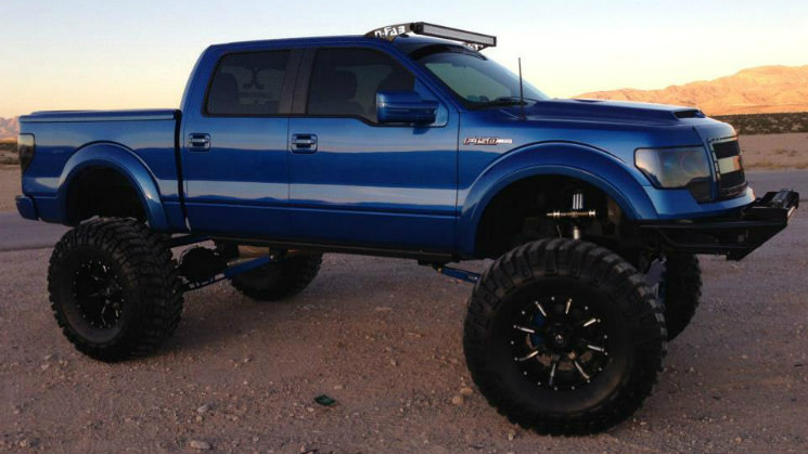 rides-ford-f150-lifted-truck-encore-blue-2010-featured