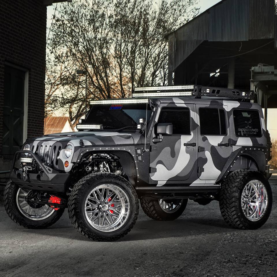 Custom Camouflaged Lifted Jeep Off Road Wheels